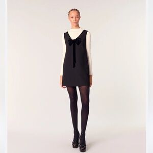 Maje Pinafore Chic Black Dress with Velvet Bow and Hidden Pockets